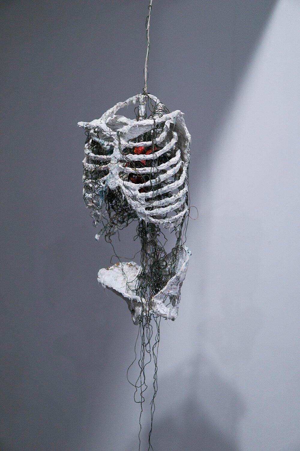 Heart of Flame, 17” (35”) x 9” x 5”, wire, aluminum foil, recycled plastic, acrylic paint, and canvas string, 2020.